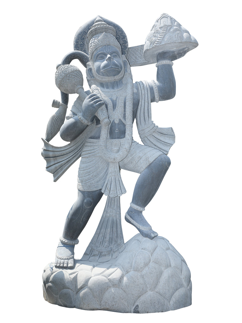 Stone statue of Hanuman with multiple arms and a weapon