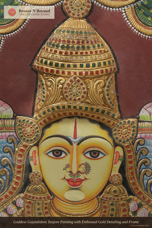Goddess Gajalakshmi Tanjore Painting with Embossed Gold Detailing and Frame
