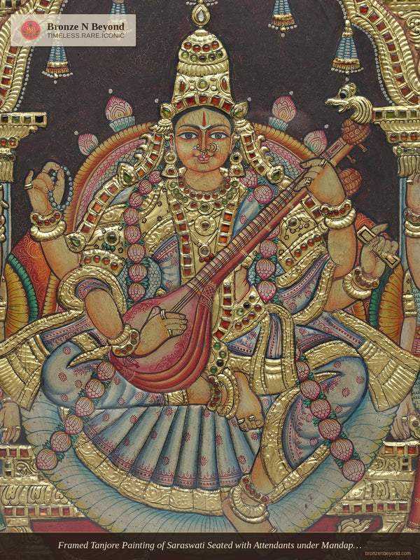 Framed Tanjore Painting of Saraswati Seated with Attendants under Mandapam Arch