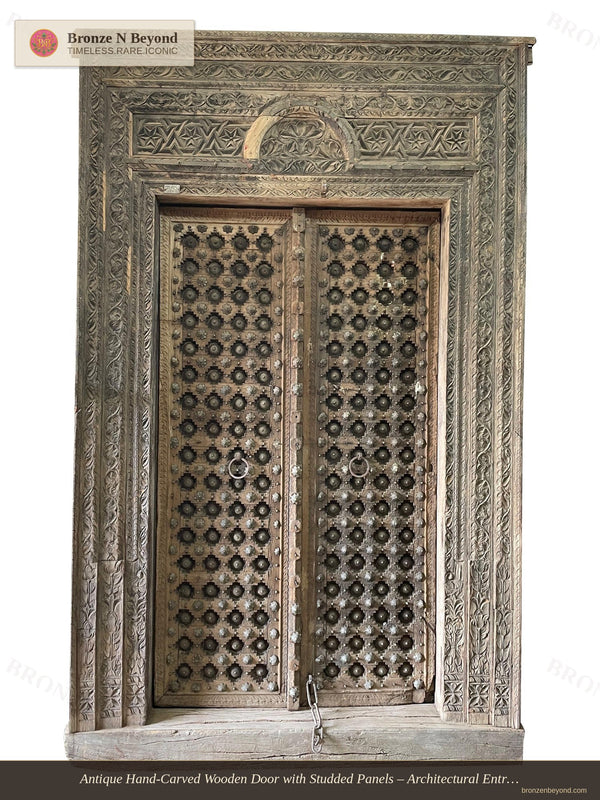 Antique Hand-Carved Wooden Door with Studded Panels