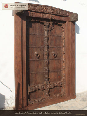 Handcrafted Wooden Door with Iron Reinforcement and Floral Design