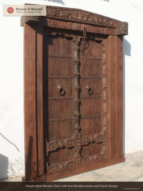 Handcrafted Wooden Door with Iron Reinforcement and Floral Design