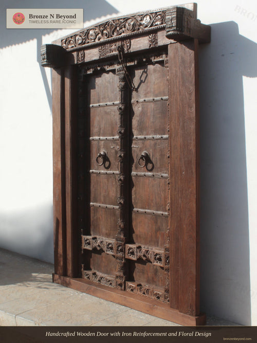 Handcrafted Wooden Door with Iron Reinforcement and Floral Design
