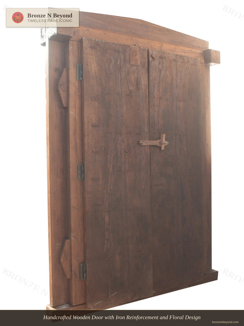 Handcrafted Wooden Door with Iron Reinforcement and Floral Design