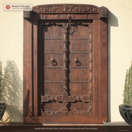 Handcrafted Wooden Door with Iron Reinforcement and Floral Design