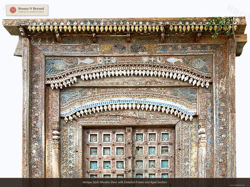 Antique Style Wooden Door with Detailed Frame and Aged Surface