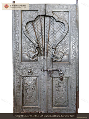 Large Old Grey Wooden Door with Carved Elephants and Vases