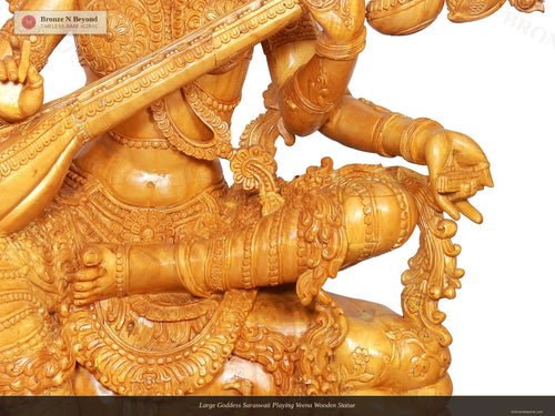 Large Goddess Saraswati Playing Veena Wooden Statue
