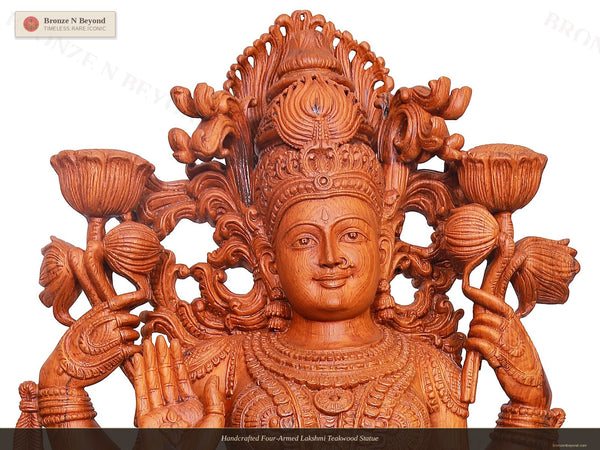 Handcrafted Four-Armed Lakshmi Teakwood Statue