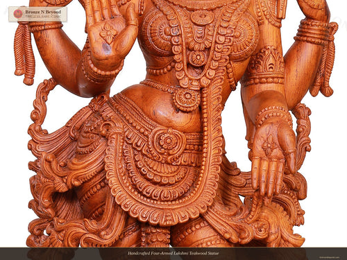 Handcrafted Four-Armed Lakshmi Teakwood Statue