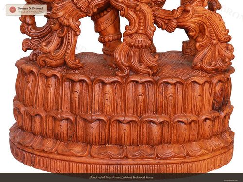 Handcrafted Four-Armed Lakshmi Teakwood Statue