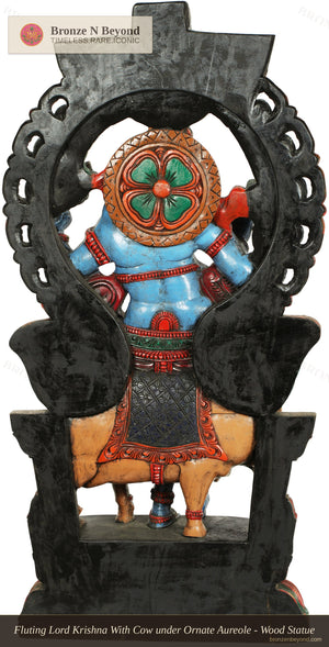 Fluting Lord Krishna With Cow under Ornate Aureole - Wood Statue