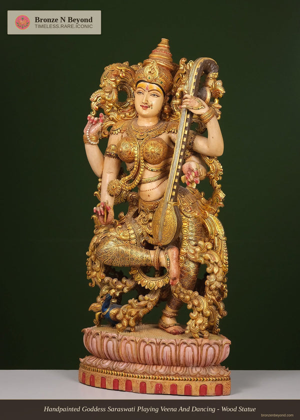 Handpainted Goddess Saraswati Playing Veena And Dancing - Wood Statue