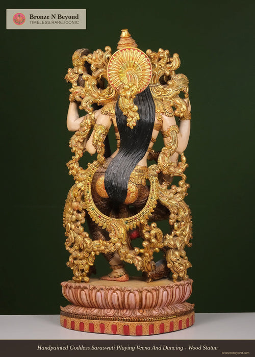 Handpainted Goddess Saraswati Playing Veena And Dancing - Wood Statue