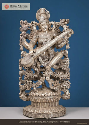Goddess Saraswati Dancing And Playing Veena - Wood Statue