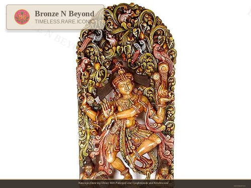 Decorative wall art with a figure holding a lamp, surrounded by intricate designs on a white background.
