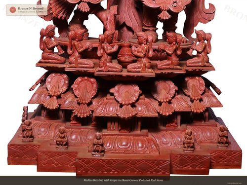 Radha–Krishna with Gopis in Hand-Carved Polished Red Stone