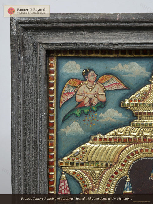 Framed Tanjore Painting of Saraswati Seated with Attendants under Mandapam Arch