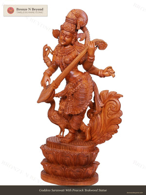 Goddess Saraswati With Peacock Teakwood Statue