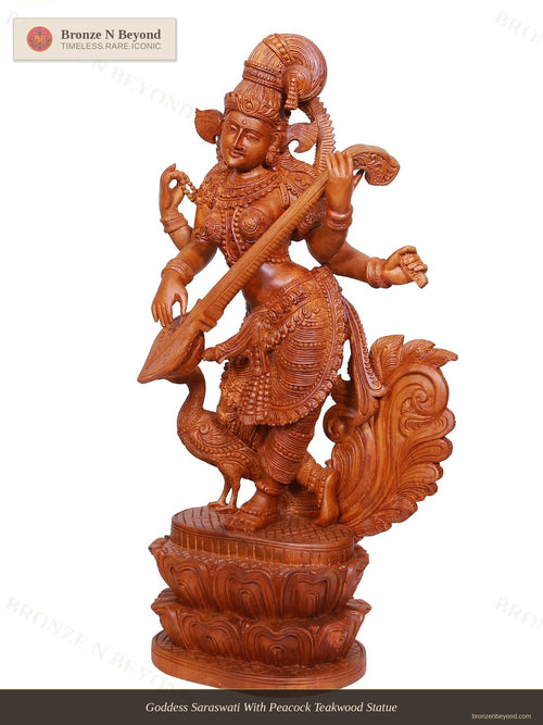 Goddess Saraswati With Peacock Teakwood Statue