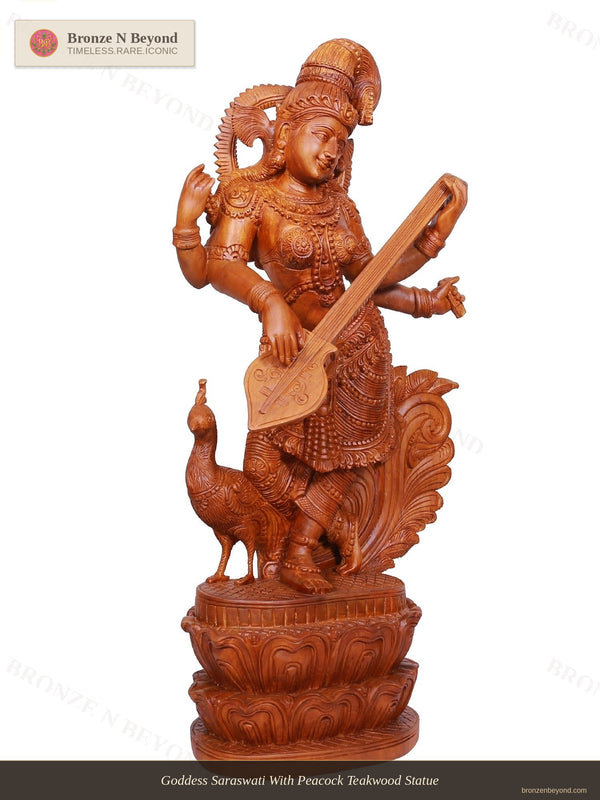 Goddess Saraswati With Peacock Teakwood Statue