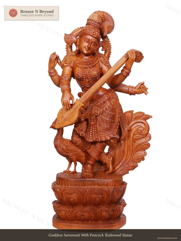 Goddess Saraswati With Peacock Teakwood Statue