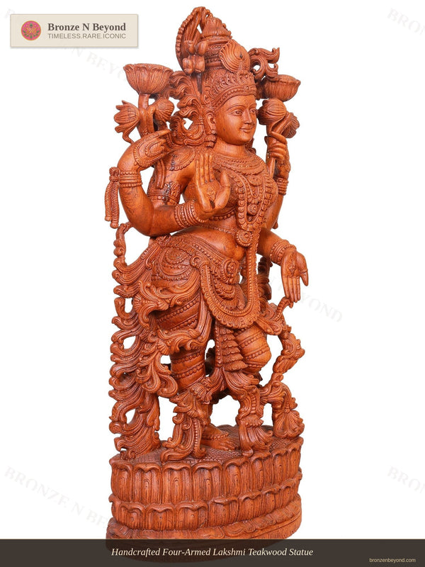 Handcrafted Four-Armed Lakshmi Teakwood Statue