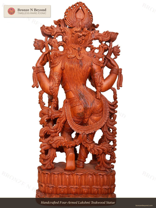 Handcrafted Four-Armed Lakshmi Teakwood Statue