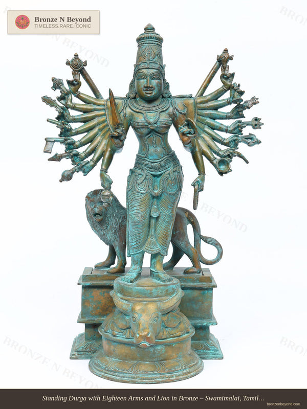 Standing Durga with Eighteen Arms and Lion in Bronze