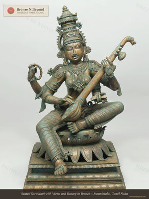 Seated Saraswati with Veena and Rosary in Bronze
