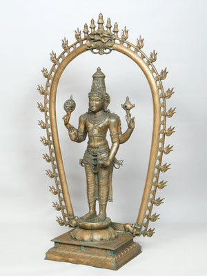 Standing Vishnu with Vatapatrashayi Krishna Apex in Ornate Prabhavali