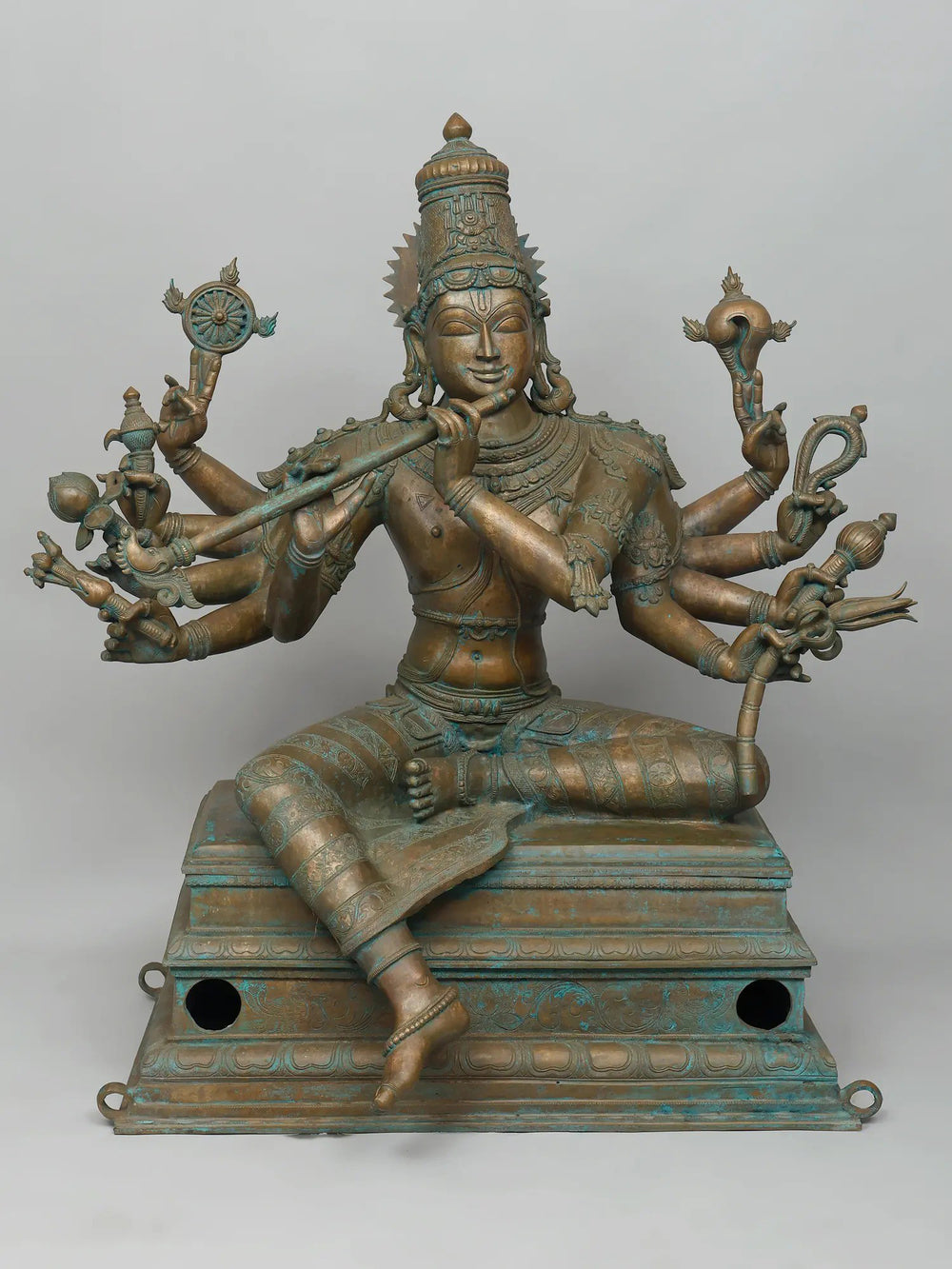 Seated Ten Armed Krishna Playing Flute In Panchaloha Bronze