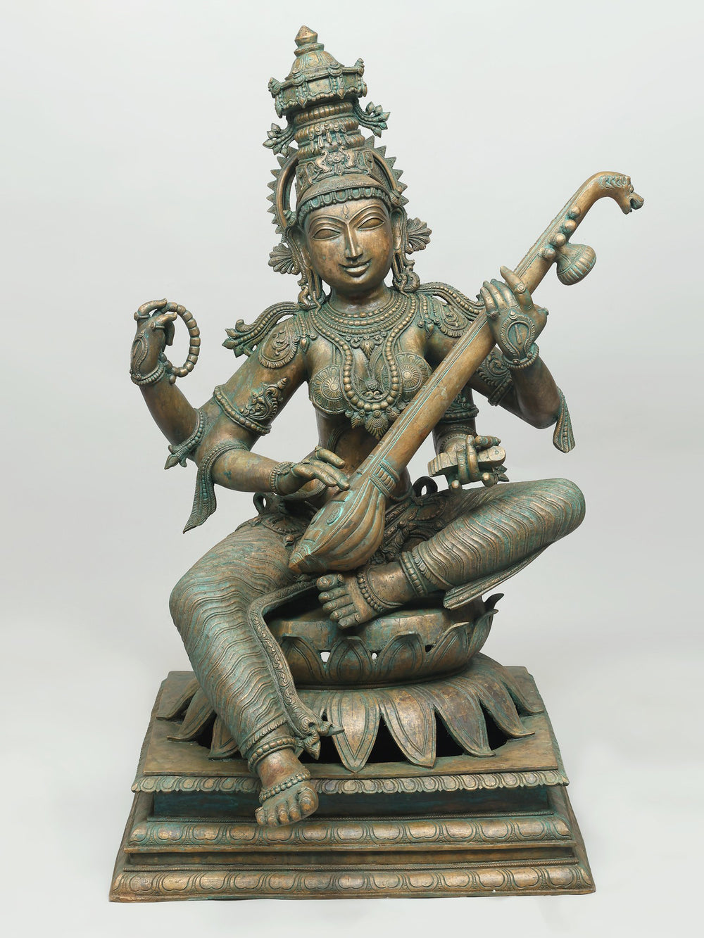 Seated Saraswati with Veena and Rosary in Bronze