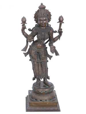 Four-Armed Lakshmi Standing on Double Lotus in Panchaloha Bronze